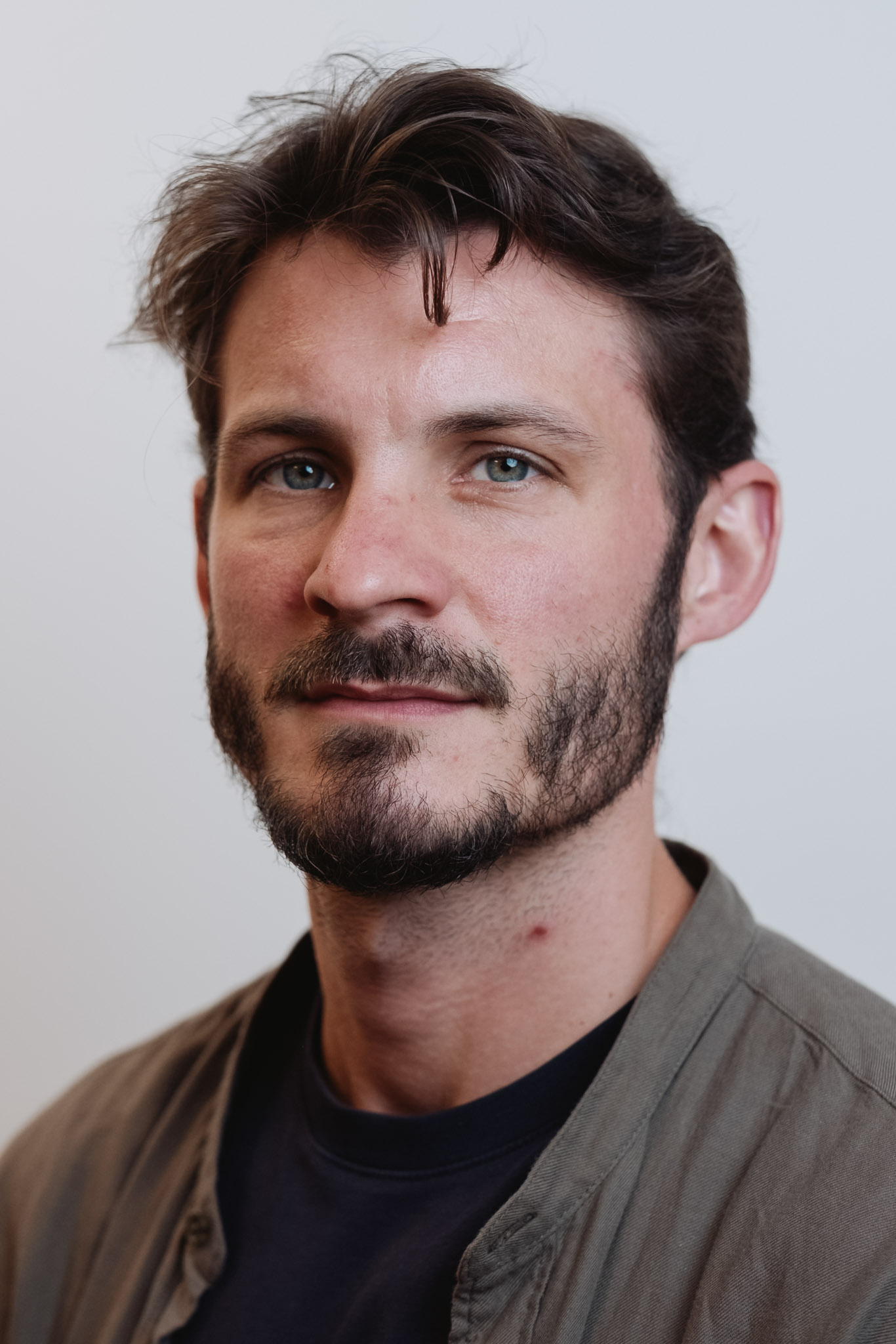 Corporate headshot — studio portrait.